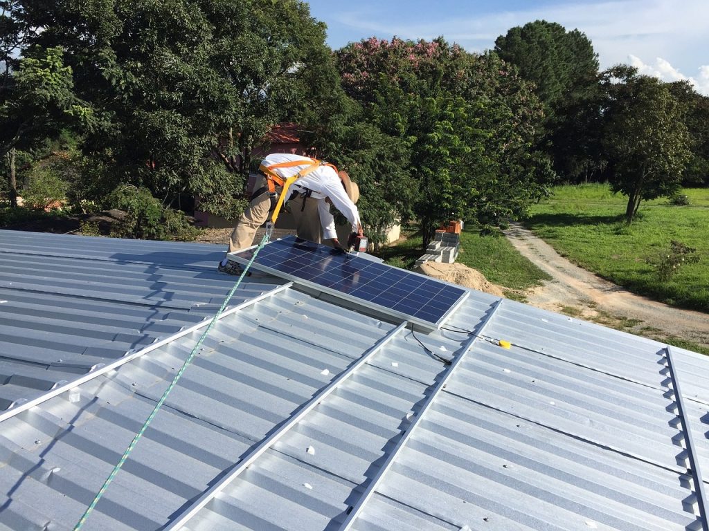 Solar technician observing safety